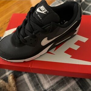 Nike Air Max 90 sneaker in a black iron grey and dark smoke grey colorway Size10